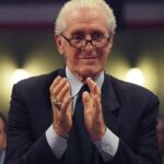 Mar 4, 2023; Miami, Florida, USA; Miami Heat president Pat Riley applauds Chris Bosh during a brief ceremony during the game between the Miami Heat and Atlanta Hawks at Miami-Dade Arena.