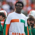 Former Miami Hurricanes wide receiver Michael Irvin on the sideline against the Georgia Tech Yellow Jackets in the first quarter at Bobby Dodd Stadium at Hyundai Field.