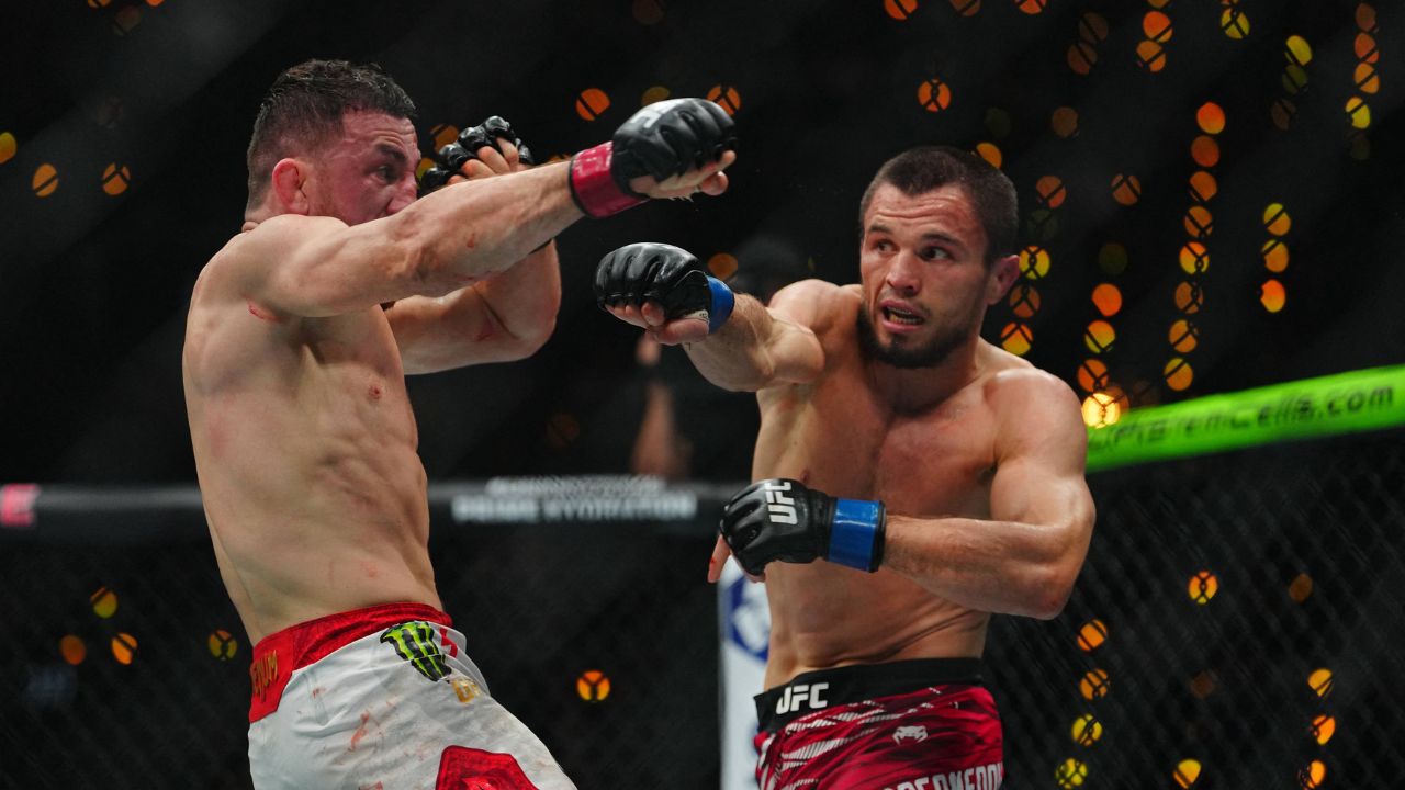 Merab Dvalishvili and Umar Nurmagomedov meet in the octagon for a 5-round co-main event bout