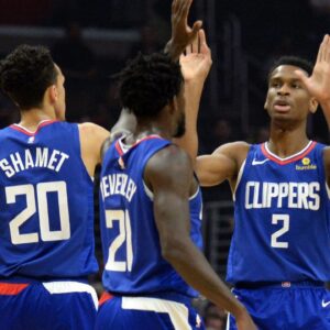 Los Angeles Clippers guard Landry Shamet (20) guard Patrick Beverley (21) and guard Shai Gilgeous-Alexander (2) react against the Memphis Grizzlies during the first half at Staples Center