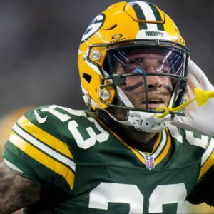 Green Bay Packers cornerback Jaire Alexander (23) reacts after intercepting a pass during the first quarter of the wild card playoff game against the Dallas Cowboys Sunday, January 14, 2024 at AT&T Stadium in Arlington, Texas.