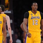 Mar 22, 2013; Los Angeles, CA, USA; Los Angeles Lakers shooting guard Kobe Bryant (24) and center Dwight Howard (12) in the first half of the game against the Washington Wizards at the Staples Center.