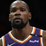 Mar 26, 2025; Phoenix, Arizona, USA; Phoenix Suns forward Kevin Durant (35) looks on against the Boston Celtics during the second half at Footprint Center.