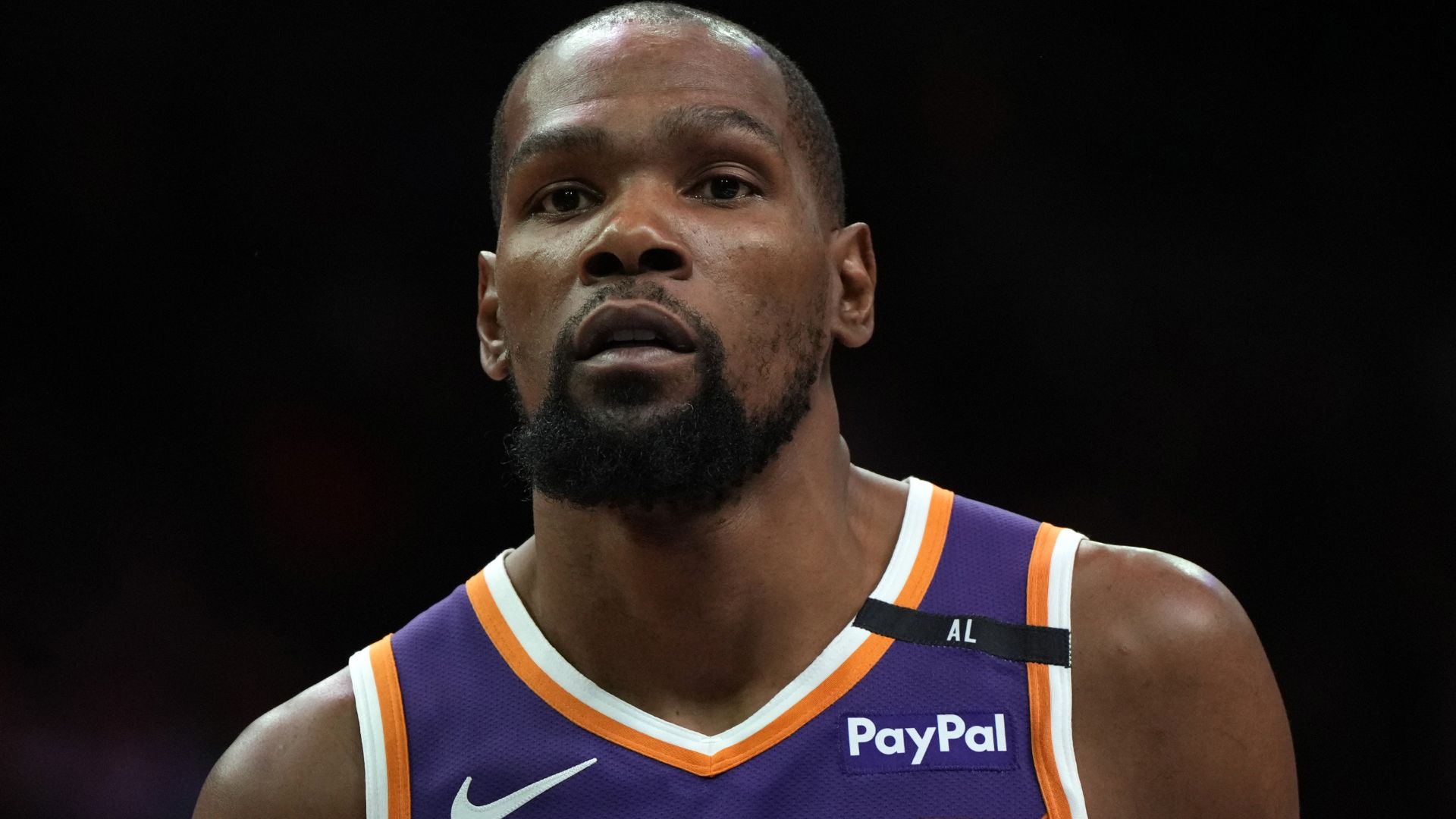 Mar 26, 2025; Phoenix, Arizona, USA; Phoenix Suns forward Kevin Durant (35) looks on against the Boston Celtics during the second half at Footprint Center.