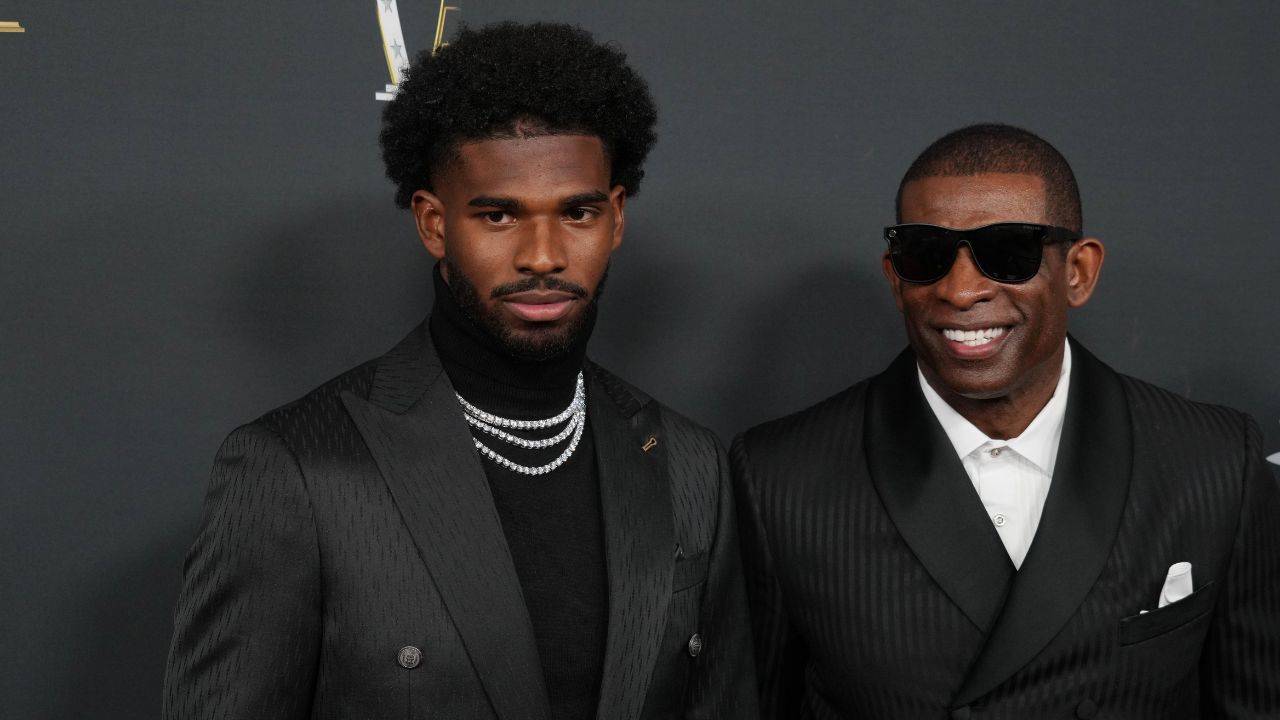 Deion Sanders (right) with his son Shedeur Sanders on the red carpet before Super Bowl LIX NFL Honors at Saenger Theatre.
