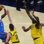Oklahoma City Thunder guard Shai Gilgeous-Alexander (2) drives to the hoop past Indiana Pacers guard T.J. McConnell (9) during the third quarter of game four of the 2025 NBA Finals