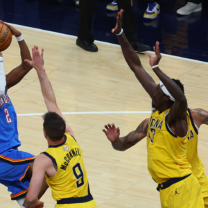 Oklahoma City Thunder guard Shai Gilgeous-Alexander (2) drives to the hoop past Indiana Pacers guard T.J. McConnell (9) during the third quarter of game four of the 2025 NBA Finals