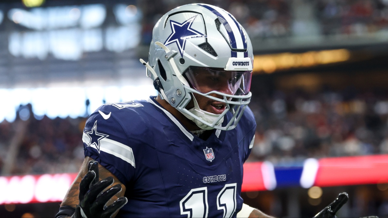 Dallas Cowboys linebacker Micah Parsons (11) celebrates after a sack during the first quarter against the Washington Commanders at AT&T Stadium.