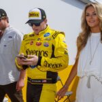 NASCAR Sprint Cup Series driver Ty Dillon (center) with girlfriend Haley Carey before the Daytona 500 at Daytona International Speedway.