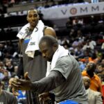 Orlando Magic guard Jason Richardson (23) celebrates his team scoring as center Dwight Howard looks on during the game against the Charlotte Bobcats at Time Warner Cable Arena.