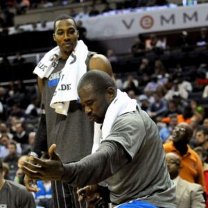 Orlando Magic guard Jason Richardson (23) celebrates his team scoring as center Dwight Howard looks on during the game against the Charlotte Bobcats at Time Warner Cable Arena.