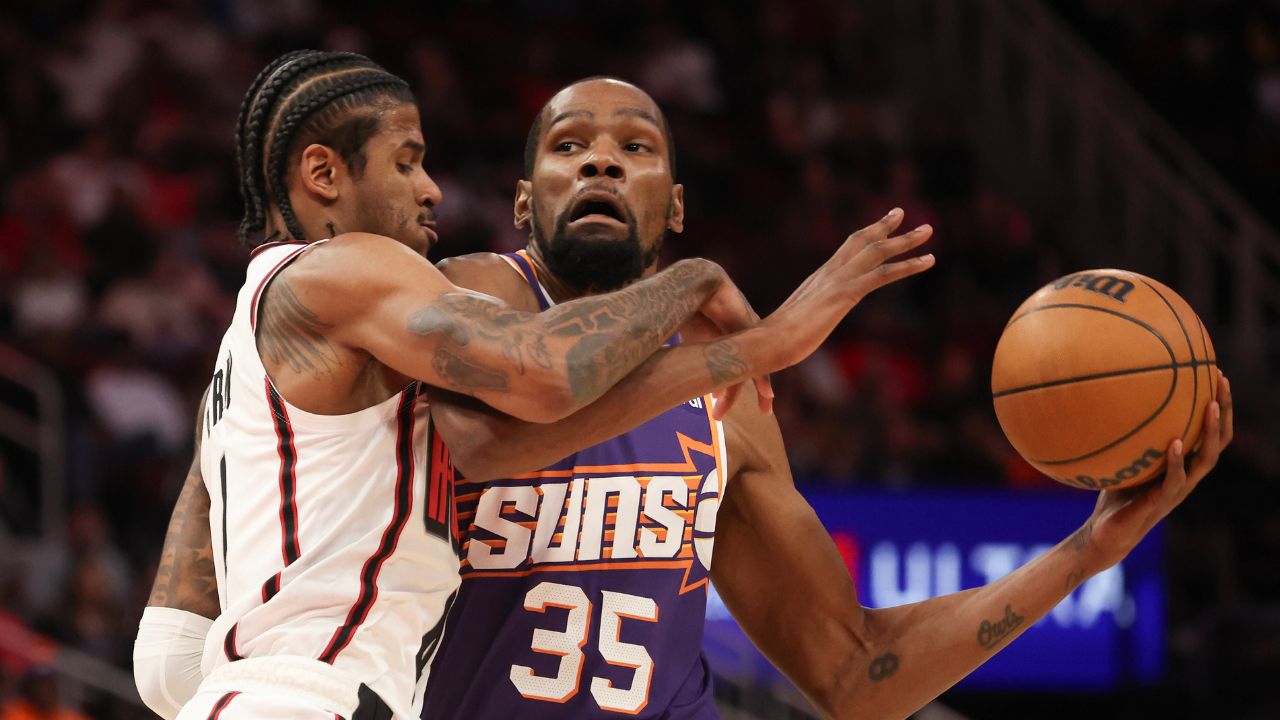 Phoenix Suns forward Kevin Durant (35) drives to the net against Houston Rockets guard Jalen Green (4) in the first quarter at Toyota Center.