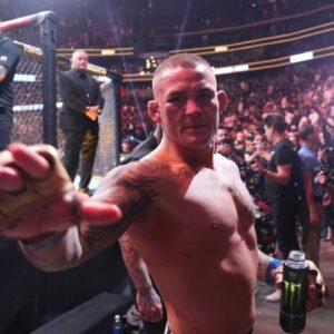 Dustin Poirier (blue gloves) after the fight against Islam Makhachev (red gloves) during UFC 302 at Prudential Center.