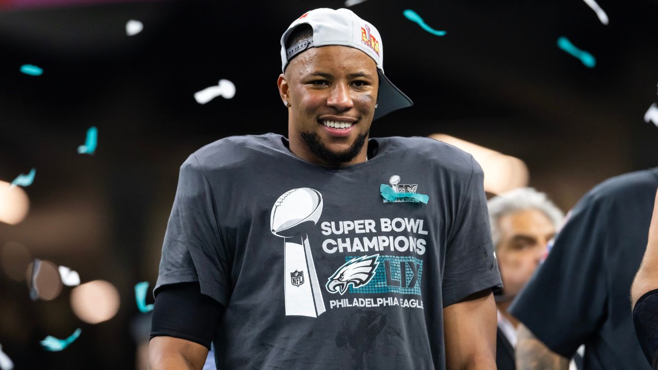 Philadelphia Eagles running back Saquon Barkley (26) celebrates after defeating the Kansas City Chiefs during Super Bowl LIX at Ceasars Superdome.