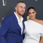 George Kittle and Claire Kittle on the red carpet before Super Bowl LIX NFL Honors at Saenger Theatre.
