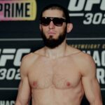 Islam Makhachev poses on the scale during the UFC 302: Weigh-in