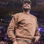 Former NBA forward Carmelo Anthony waves to the crowd during game five of first round for the 2025 NBA Playoffs between the against the Detroit Pistons and the New York Knicks at Madison Square Garden.