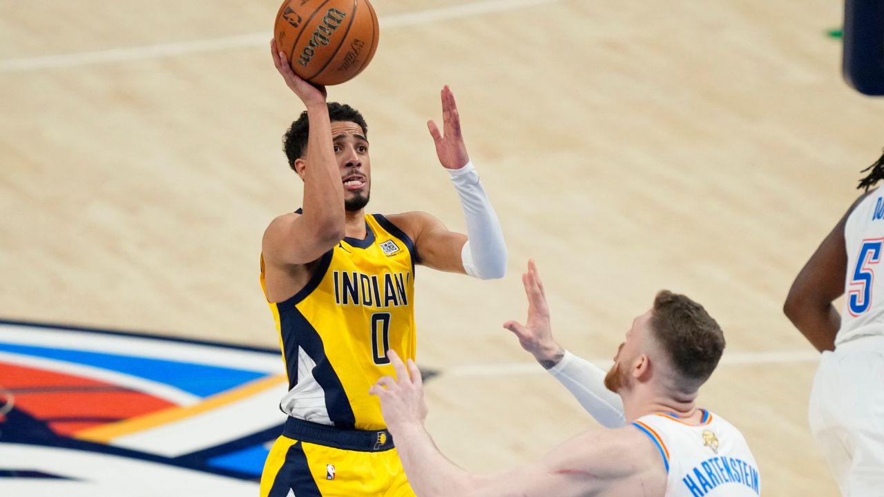 Jun 5, 2025; Oklahoma City, Oklahoma, USA; Indiana Pacers guard Tyrese Haliburton (0) shoots the ball against Oklahoma City Thunder center Isaiah Hartenstein (55) during the third quarter in game one of the 2025 NBA Finals at Paycom Center. Mandatory Credit: Kyle Terada-Imagn Images