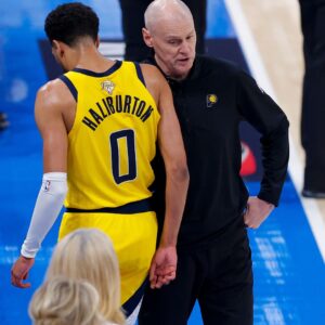 Jun 16, 2025; Oklahoma City, Oklahoma, USA; Indiana Pacers guard Tyrese Haliburton (0) comes off the floor past head coach Rick Carlisle in the first quarter against the Oklahoma City Thunder during game five of the 2025 NBA Finals at Paycom Center.