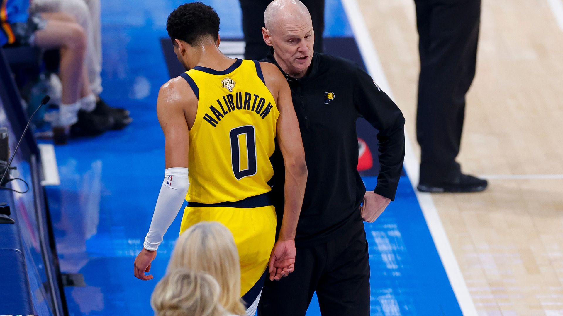 Jun 16, 2025; Oklahoma City, Oklahoma, USA; Indiana Pacers guard Tyrese Haliburton (0) comes off the floor past head coach Rick Carlisle in the first quarter against the Oklahoma City Thunder during game five of the 2025 NBA Finals at Paycom Center.