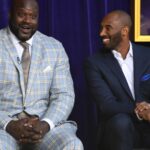 Mar 24, 2017; Los Angeles, CA, USA; Los Angeles Lakers former center Shaquille O'Neal (left) and guard Kobe Bryant react during ceremony to unveil statue of O'Neal at Staples Center.