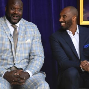 Mar 24, 2017; Los Angeles, CA, USA; Los Angeles Lakers former center Shaquille O'Neal (left) and guard Kobe Bryant react during ceremony to unveil statue of O'Neal at Staples Center.