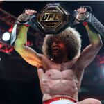 Merab Dvalishvili (red gloves) reacts after defeating Sean O’Malley (not pictured) in a bantamweight title fight during UFC 316 at Prudential Center.