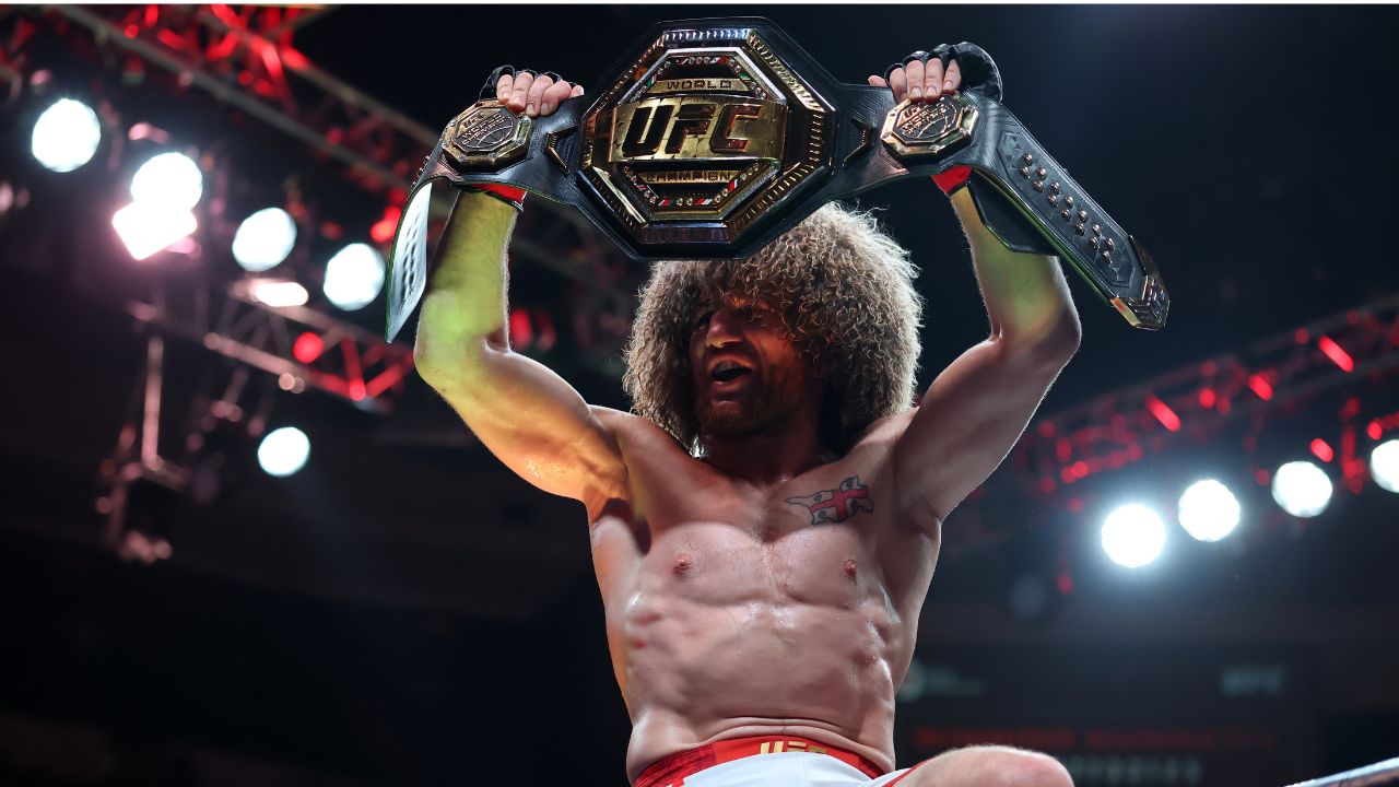 Merab Dvalishvili (red gloves) reacts after defeating Sean O’Malley (not pictured) in a bantamweight title fight during UFC 316 at Prudential Center.