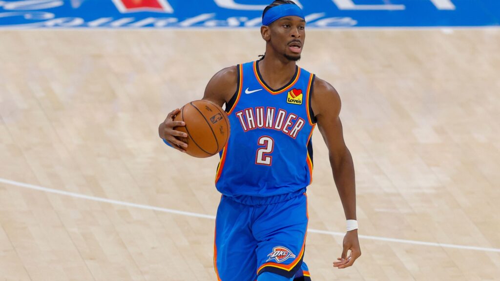 Jun 8, 2025; Oklahoma City, Oklahoma, USA; Oklahoma City Thunder guard Shai Gilgeous-Alexander (2) brings the ball up court against the Indiana Pacers during the first quarter of game two of the 2025 NBA Finals at Paycom Center.