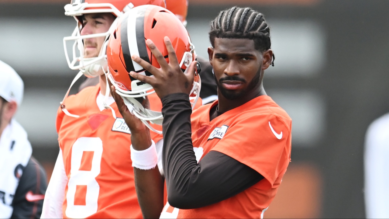 Cleveland Browns quarterback Shedeur Sanders (12) listens to a play call during mini camp at CrossCountry Mortgage Campus.