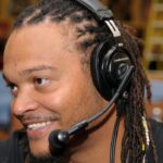 NFL former player Channing Crowder is interviewed on radio row at the Super Bowl XLVI media center at the J.W. Marriott.