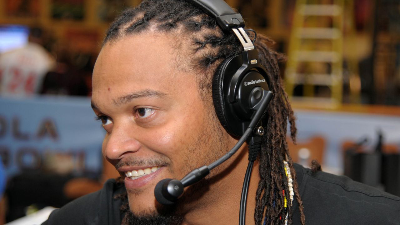 NFL former player Channing Crowder is interviewed on radio row at the Super Bowl XLVI media center at the J.W. Marriott.