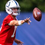 Indianapolis Colts quarterback Daniel Jones (17) pitches a ball during training camp at the Farm Bureau Football complex.
