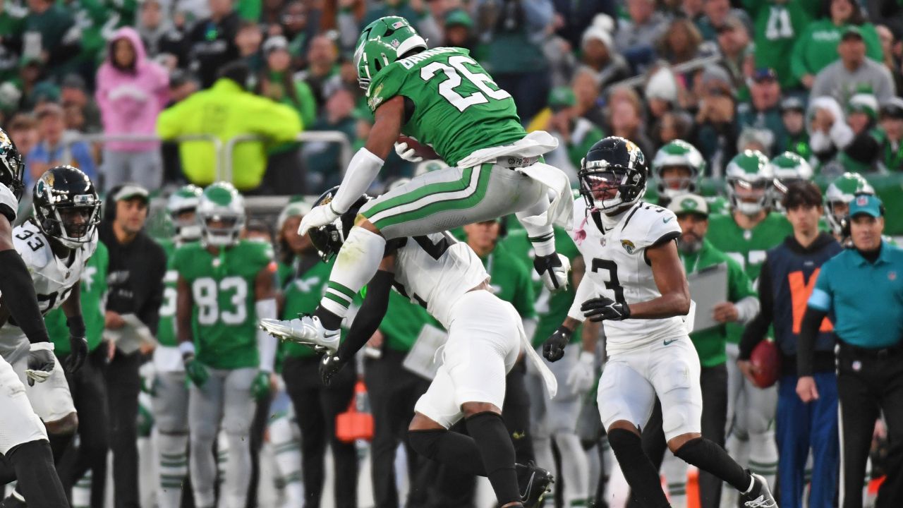 Philadelphia Eagles running back Saquon Barkley (26) jumps over Jacksonville Jaguars cornerback Jarrian Jones (22) during the second quarter at Lincoln Financial Field.