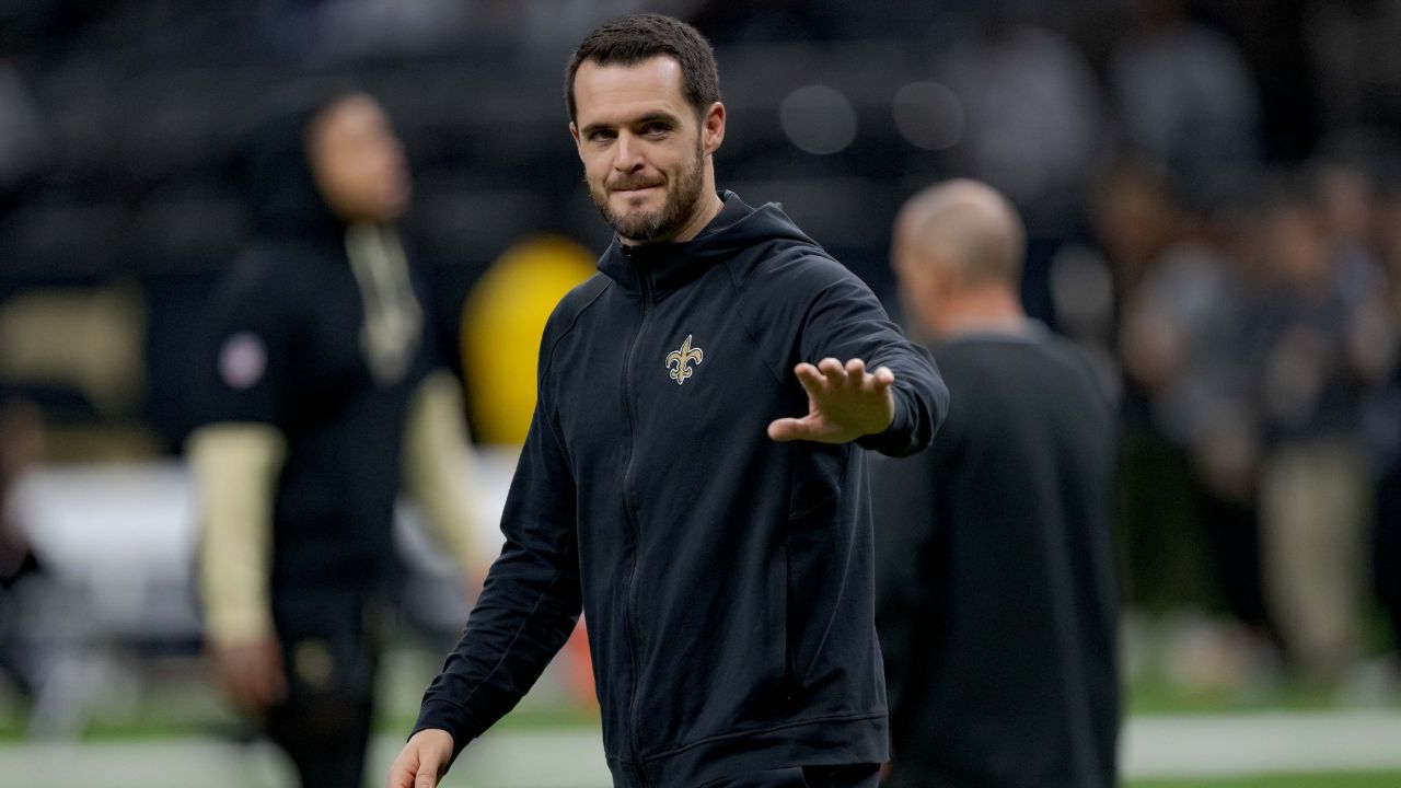 New Orleans Saints quarterback Derek Carr (4) walks the field before a game against the Las Vegas Raiders at Caesars Superdome.