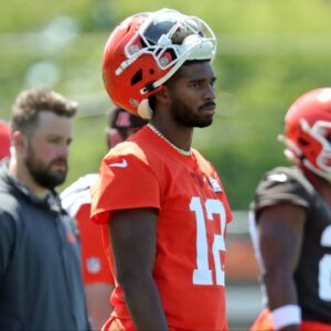 Cleveland Browns quarterback Shedeur Sanders (12) watches from the sideline during day two of NFL rookie minicamp at the Cleveland Browns training facility on Saturday, May 10, 2025, in Berea, Ohio.