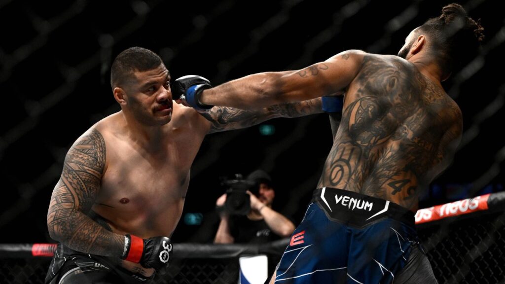 Justin Tafa of New Zealand (left) and Austen Lane of the USA during the heavyweight bout of UFC 293