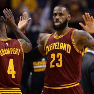 Jan 8, 2017; Phoenix, AZ, USA; Cleveland Cavaliers forward LeBron James (23) slaps hands with Cleveland Cavaliers guard Iman Shumpert (4) during the first half against the Phoenix Suns at Talking Stick Resort Arena.