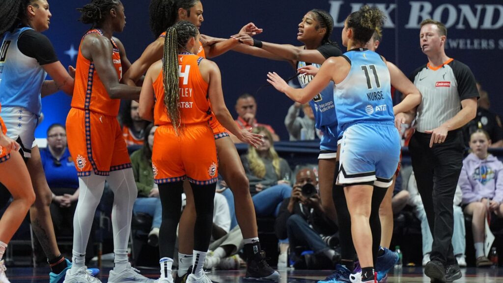 Jun 15, 2025; Uncasville, Connecticut, USA; Chicago Sky forward Angel Reese (5) pushes Connecticut Sun forward Olivia Nelson-Ododa (10) in the second half at Mohegan Sun Arena.