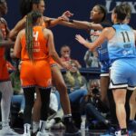 Jun 15, 2025; Uncasville, Connecticut, USA; Chicago Sky forward Angel Reese (5) pushes Connecticut Sun forward Olivia Nelson-Ododa (10) in the second half at Mohegan Sun Arena.