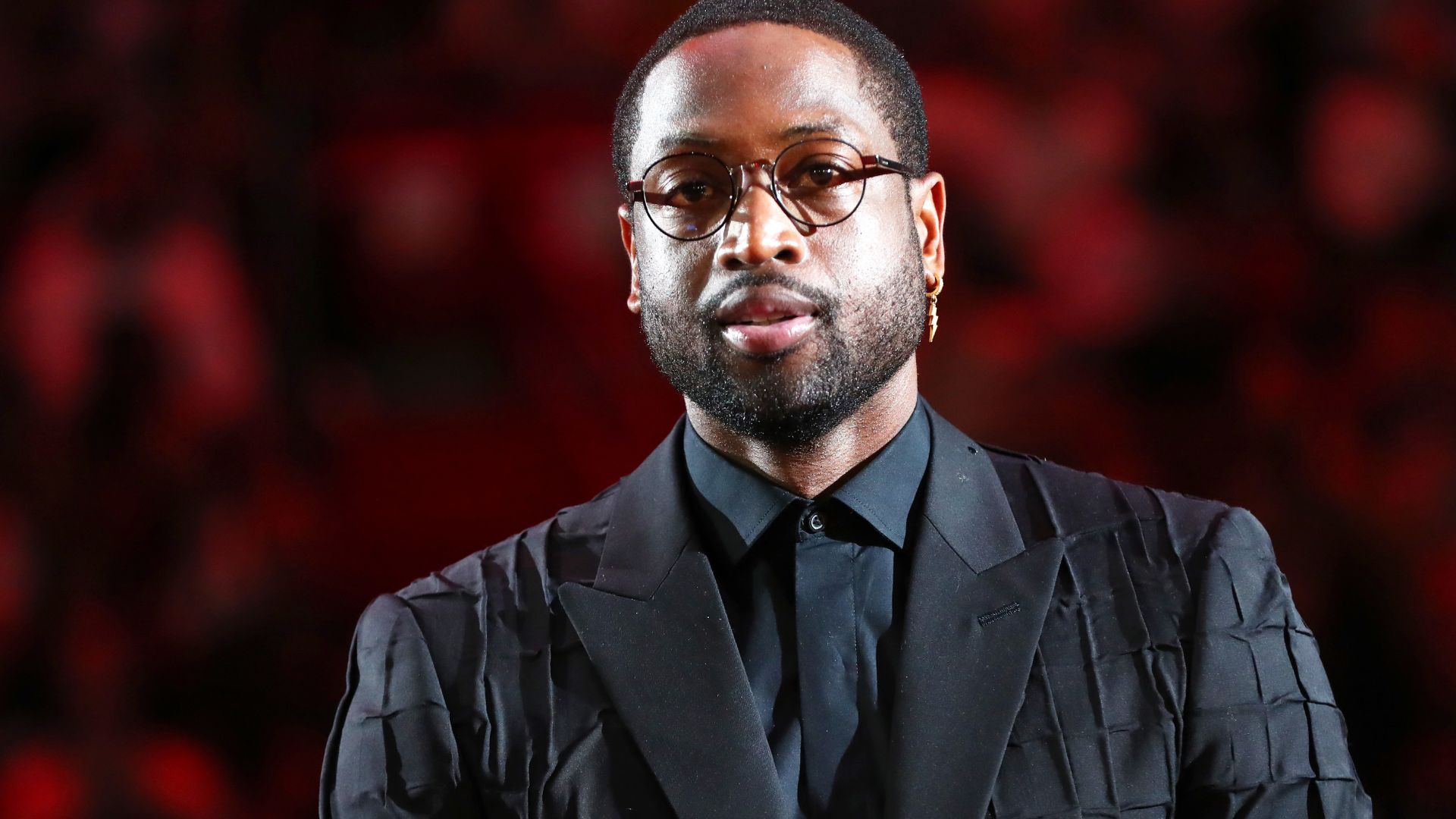 Feb 22, 2020; Miami, Florida, USA; Miami Heat former player Dwyane Wade reacts during the second quarter at American Airlines Arena