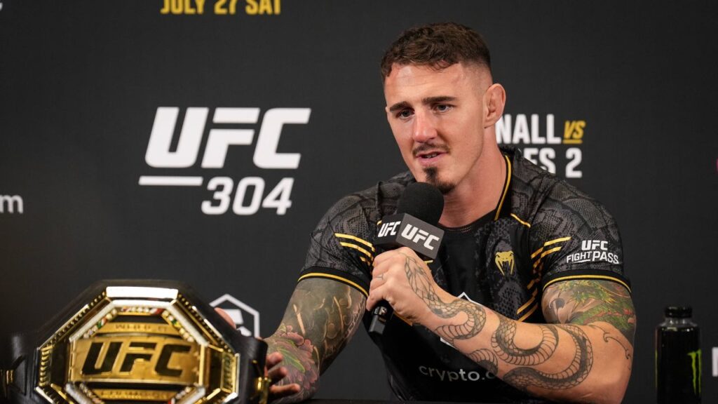 Tom Aspinall with post event media during the UFC 304 event