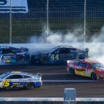 NASCAR Cup Series drivers Cody Ware (51) and Todd Gilliland (38) crash alongside David Ragan (15) and Greg Biffle (44) during the Folds of Honor QuikTrip 500 at Atlanta Motor Speedway.