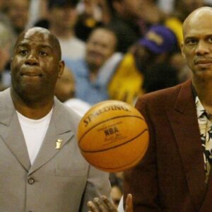 Past Lakers greats Magic Johnson and Kareem Abdul Jabar share mid court for pre-game ceremonies prior to the start of Game 1 of the NBA Basketball Herren USA Finals between the Detroit Pistons and Los Angeles Lakers at the Staples Center in Los Angeles, California, on June 6, 2004.