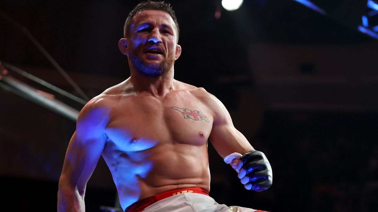 Merab Dvalishvili (red gloves) reacts after defeating Sean O’Malley (not pictured) in a bantamweight title fight during UFC 316 at Prudential Center.
