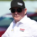 Hendrick Motorsports Vice Chairman Jeff Gordon stands on pit road prior to the Straight Talk Wireless 400 at Homestead-Miami Speedway.