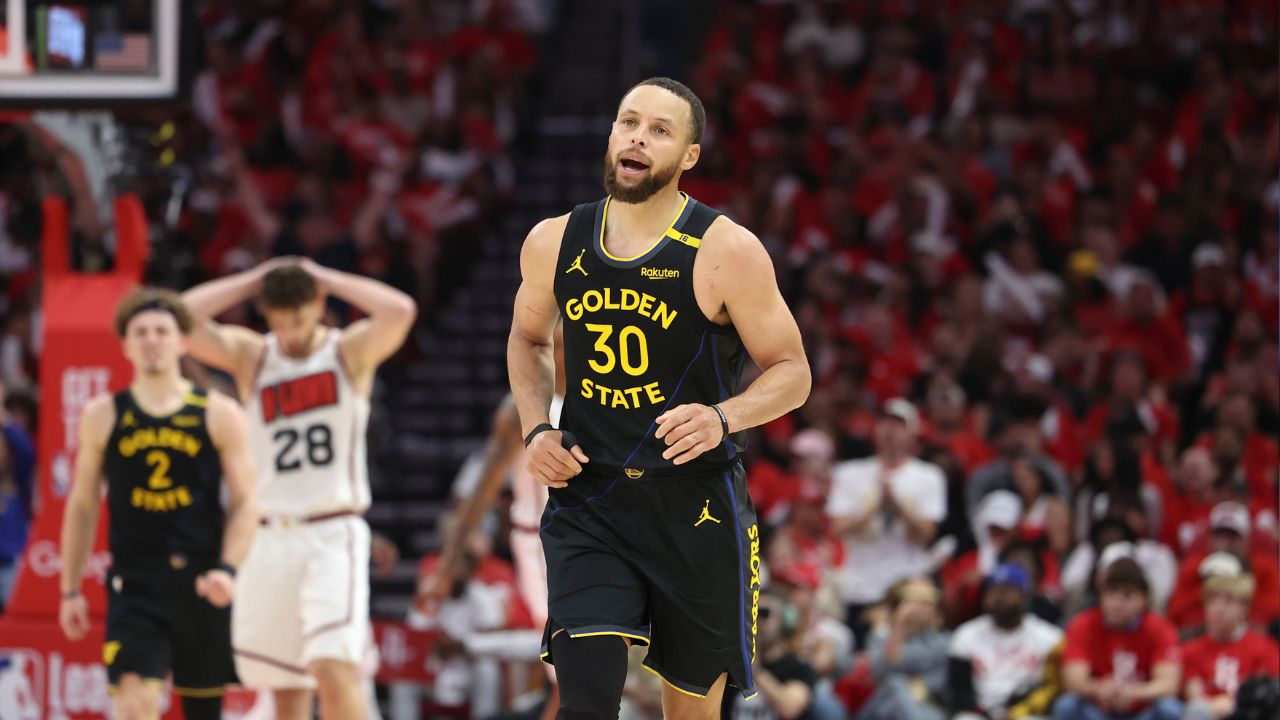 Golden State Warriors guard Stephen Curry (30) reacts after scoring a basket during the second half of game seven of the first round for the 2025 NBA Playoffs against the Houston Rockets at Toyota Center.