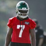 New York Jets quarterback Justin Fields (7) looks on during a drill at training camp at Atlantic Health Jets Training Center.