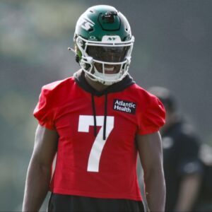 New York Jets quarterback Justin Fields (7) looks on during a drill at training camp at Atlantic Health Jets Training Center.