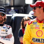 BRISTOL, TN - SEPTEMBER 20: Joey Logano ( 22 Team Penske Shell Pennzoil Ford) talks with Ryan Blaney ( 12 Team Penske Wurth Ford) during practice for the Cup Series Bass Pro Shops Night Race on September 20, 2024 at Bristol Motor Speedway in Bristol, TN. (Photo by Jeff Robinson Icon Sportswire) AUTO: SEP 20 NASCAR Cup Series Bass Pro Shops Night Race EDITORIAL USE ONLY Icon2409201845